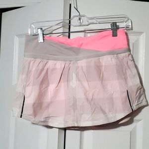 Lululemon,  size small,  tennis skirt, pink & Grey, shorts underneath
